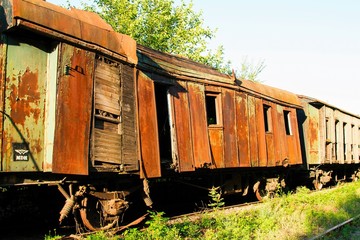 Fototapeta na wymiar Old rusty Russian train. Train cemetery.