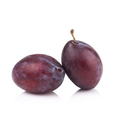 ripe prune or plum isolated on a white background.
