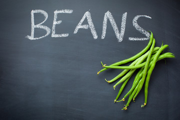 green beans on blackboard