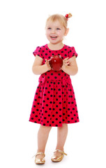 Blonde girl with an Apple