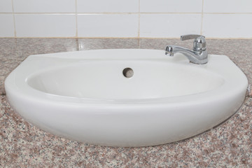 Old sink with faucet on top