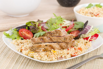 Grilled Pork & Couscous with Salad.
