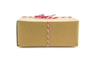 Parcel cardboard box and tied with string