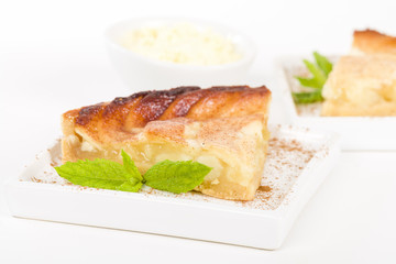 Tarte Aux Pommes - Apple pie served with cream.

