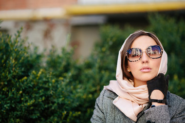girl sitting on a bench in the park