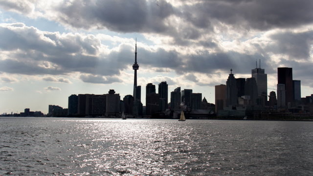 Toronto Harbour Time-Lapse 1. Time-lapse of about 45 minutes of the Toronto skyline and harbor with seagulls, ships and sailboats. Filmed on a beautiful summer afternoon.