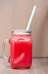 Watermelon smoothie in a mason jar