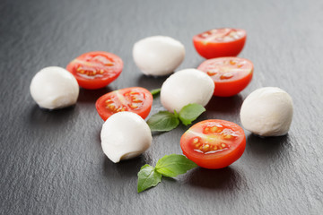 mozzarella balls with tomatoes and basil