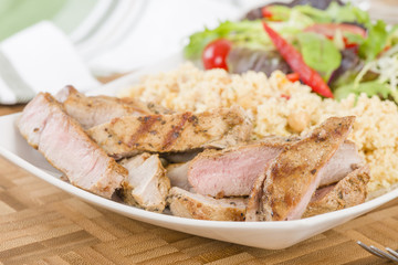 Grilled Pork & Couscous with Salad.
