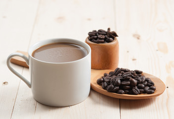 Coffee bean with wooden spoon