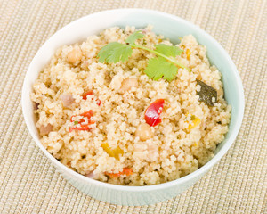 Couscous - Roasted vegetable couscous in a a bowl.
