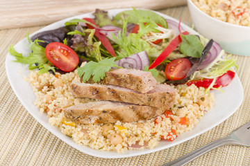 Grilled Pork & Couscous with Salad.
