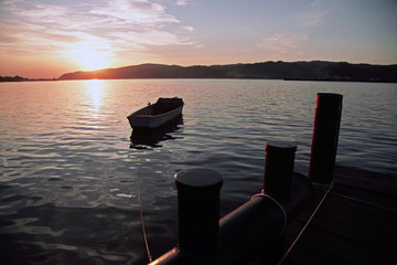 Landscape sunset scenery water and dock and boat