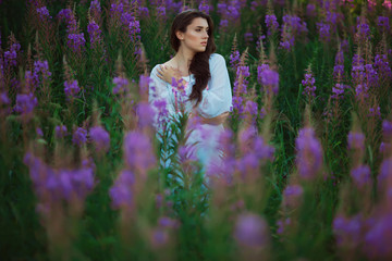 Woman standing   on a lavender field