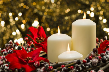 White candles in autumn winter decoration
