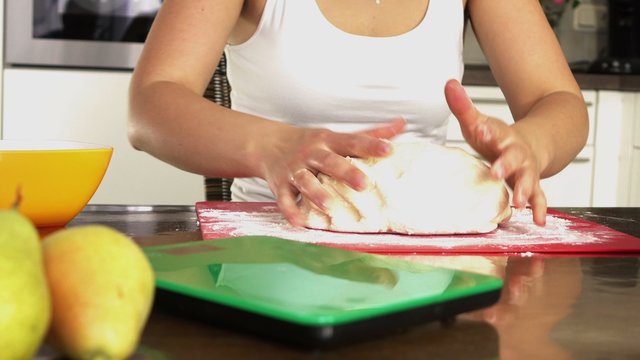 Female Hands Making Dough. 