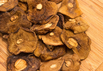 Dried mushrooms on canvas