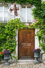 Fototapeta na wymiar Front Door of an Old Switzerland Cottage House