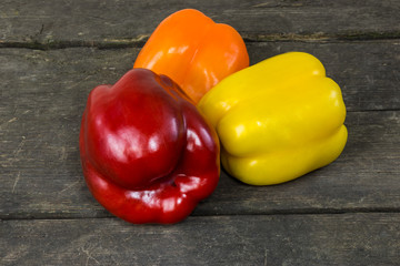 Sweet pepper on a rustic wooden background