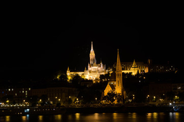 Fototapeta na wymiar Matthias church and the Fisherman's Bastion at night in Budapest