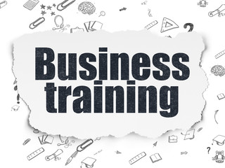 Learning concept: Business Training on Torn Paper background