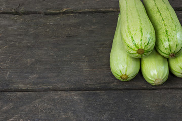 courgette on a rustic wooden background