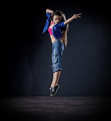 Fototapeta na wymiar Young girl modern dancer (dark ver)