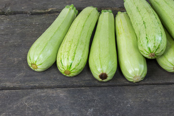 courgette on a rustic wooden background