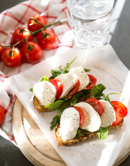  bruschetta with mozzarella and tomatoes