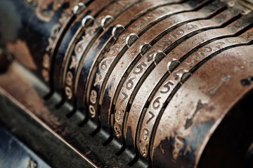 vintage mechanical manual counting machine for mathematical calc
