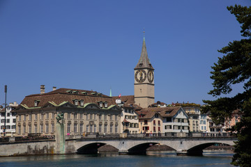 Limmat riverside with famous clock tower, Zurich