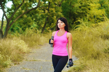 The girl is engaged in sports in the Park