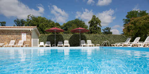 Private swimming pool at summertime