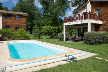 Private swimming pool at summertime