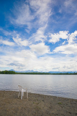 Plastic Chair on Lake Shore