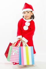 Asian Little Santa Claus with shopping bag