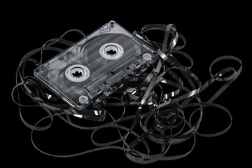 Close up of vintage audio tape cassette, isolated on black, with
