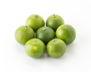 green lemon isolated on white background