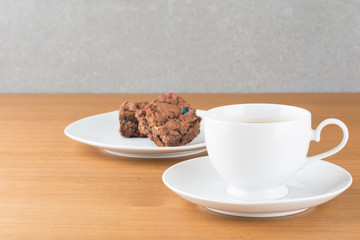 a cup of chocolate with brownie