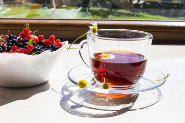 camomile tea with fresh berries