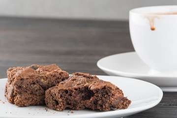 brownies in plate on wood table