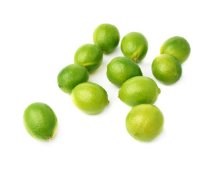 Surface covered with multiple ripe limes, composition isolated