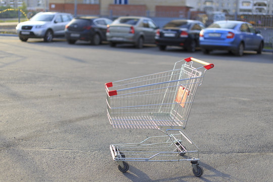 shopping cart. the shopping cart left in the Parking lot of the store