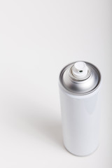 Colour spray can on white background