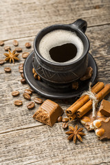 coffee and cookies on wood background