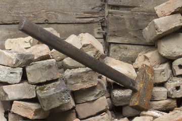 Hammer and broken brick