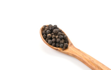 Black pepper with wood spoon