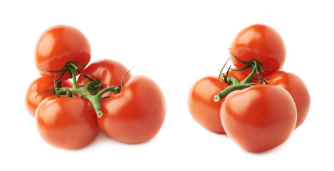 Multiple red tomatoes on a single stem
