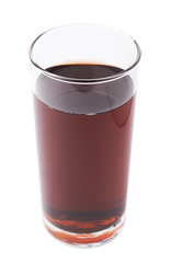 Glass filled with the red juice isolated