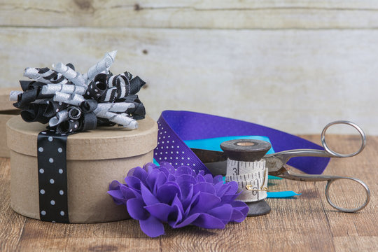 Gift box with scissors and ribbon